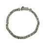 Silver chain on hand for a man
