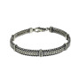 Silver chain on hand for a man