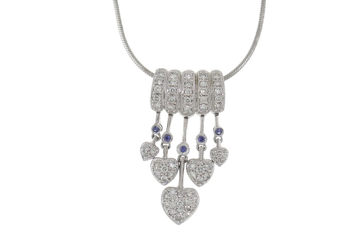 Gold pendant with diamonds and sapphires