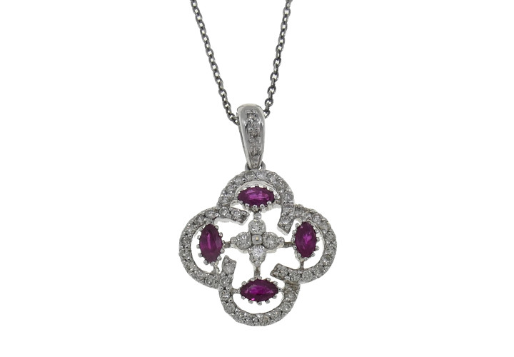 Gold pendant with diamonds and rubies